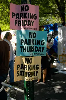 Prevent Prints: NYPD No Parking signs in the East Village during a street fair
