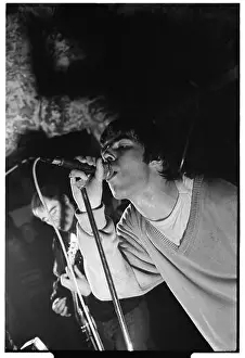 On Stage Prints: OASIS, FIRST UK HEADLINE TOUR, 1994: Liam Gallagher of Oasis at the legendary TJs in Newport