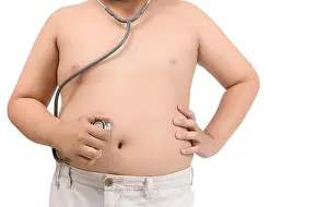Waist Prints: Obese fat boy check stomach by stethoscope isolated on white background, Healthy concept