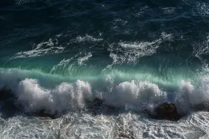 Ocean Wave Prints: Ocean wave background breaking sea water rocky shore rough seas turquoise water gradient foam