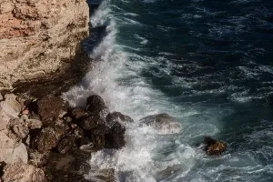 Hurricane Prints: Ocean wave background breaking sea water rocky shore rough seas turquoise water gradient foam