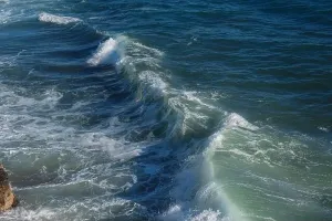 Hurricane Prints: Ocean wave background breaking sea water rocky shore rough seas turquoise water gradient foam