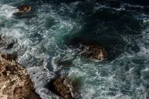 Hurricane Prints: Ocean wave background breaking sea water rocky shore rough seas turquoise water gradient foam