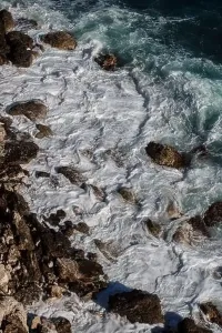 Hurricane Prints: Ocean wave background breaking sea water rocky shore rough seas turquoise water gradient foam