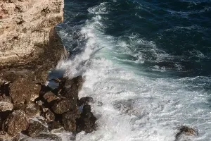 Hurricane Prints: Ocean wave background breaking sea water rocky shore rough seas turquoise water gradient foam