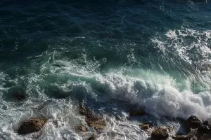 Swell Prints: Ocean wave background breaking sea water rocky shore rough seas turquoise water gradient foam