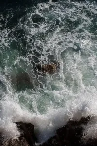 Swell Prints: Ocean wave background breaking sea water rocky shore rough seas turquoise water gradient foam