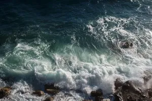 Swell Prints: Ocean wave background breaking sea water rocky shore rough seas turquoise water gradient foam