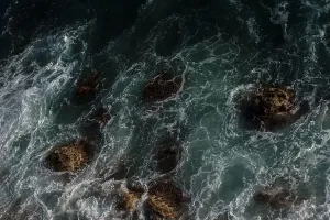 Swell Prints: Ocean wave background breaking sea water rocky shore rough seas turquoise water gradient foam
