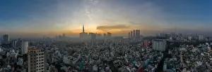 Five o'clock, early morning aerial urban panorama of Ho Chi Minh City featuring city center