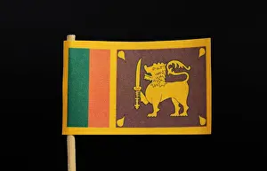 Independence Day Prints: The official and national flag of Sri Lanka on toothpick on black background