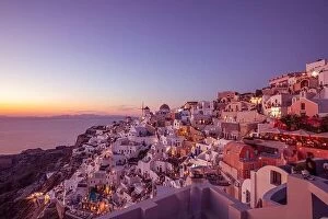 Images Dated 9th October 2019: Oia town cityscape at Santorini island in Greece. Stunning sunset landscape seascape, tranquil