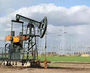 Lever Prints: oil field with pumpjack