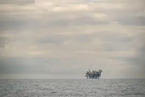 Shimmering Prints: Oil Rig Against A Cloudy Sky Off The Coast of Ventura, California