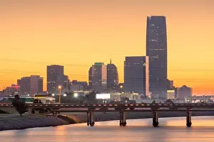 Oklahoma City, Oklahoma, USA downtown skyline on the Oklahoma River at dusk