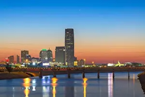 Oklahoma City, Oklahoma, USA downtown skyline on the Oklahoma River at dusk