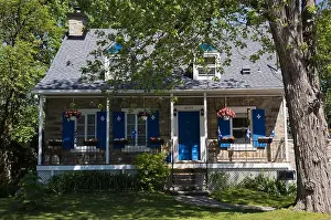Motifs Prints: Old 1839 blue with white trim fieldstone style house in summer