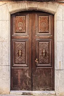 Strong Prints: Old and beautiful carved wooden door in Polop village, Alicante, Spain