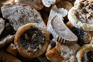 Compost Prints: Old bread and sweet buns with visible mold are piled together for drying