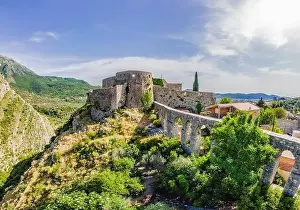 Serbian Prints: Old city. Sunny view of ruins of citadel in Stari Bar town near Bar city