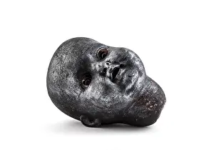 Macabre Prints: Old creepy doll head on white background with clipping path