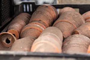 Distress Prints: Old and dirty terracotta plant pots in a tray