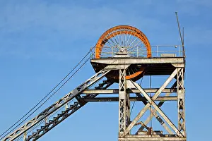 Winding Prints: Old, disused mine shaft headgear with pulley wheel