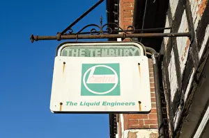 Engineers Prints: Old faded sign advertising Castrol oil hanging in Tenbury Wells, Worcestershire