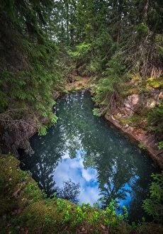Images Dated 7th July 2017: Old and historical mine full with greenish jade color water in middle of forest