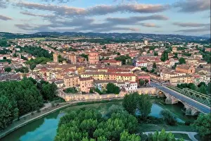 Old italian city Umbertide near Tevere river with cloudy sky and sunset light