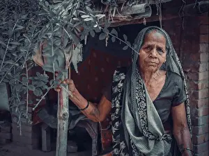 Fabulous Prints: A old lady stand at there house