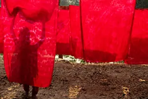 Threads Prints: The old man colored threads are drying through conventional way under sunlight