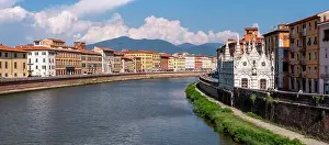 Arno Prints: Old picturesque houses at the Arno river waterfront in Pisa