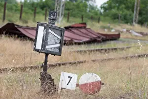Lever Prints: Old railway cross switch. Railway shunt. Old overgrown used railway track switch mechanism