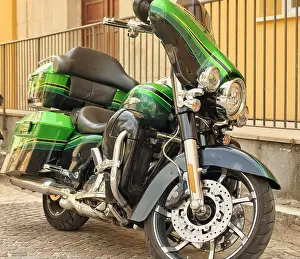 Switch Prints: old retro motorcycle traveling through city streets