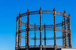North Norfolk Prints: Old retro rusty Gas Holder or Gas tower against a blue sky in Great Yarmouth, Norfolk, UK
