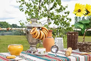 Cloudiness Prints: Old Russian rustic table with samovar