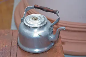 Aluminum Prints: An old slightly damaged aluminum kettle