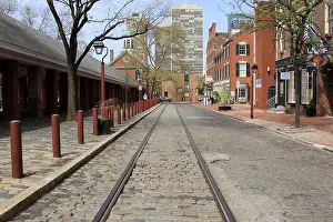 Tram Prints: Old street car tracks on the cobblestone pavement