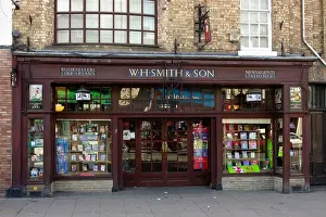 Front Prints: Old style shop front of national newsagent WH Smith and Son in Newtown Powys Mid Wales UK