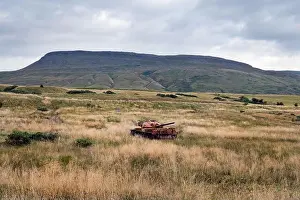 Nature Conservation Prints: An old tank lies derelict on the Warcop army firing range, Cumbria, UK