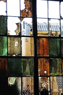Albuquerque Prints: Old train can be seen through the broken windows at the Albuquerque Rail Yards -- the former repair complex of