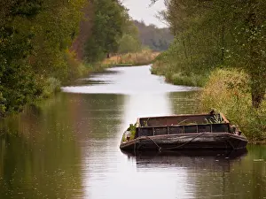 Barge Prints: Old vintage agricultural peat barge in a dutch natural canal