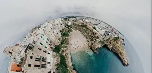 Old white city near blue the Sea Polignano Apulia Coastline blue in Italy Drone 360 vr