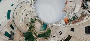 Alberobello Prints: Old white city near blue the Sea Polignano Apulia Coastline blue in Italy Drone 360 vr