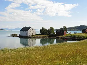 Wooden House Prints: Old wooden house on the waterfront at Ervik, near Harstad, Hinnøya, Troms, arctic Norway