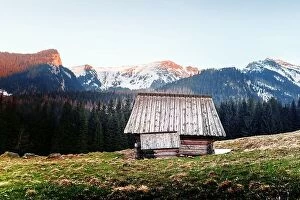 Images Dated 18th April 2019: Old wooden hut and sunset sky in spring High Tatras mountains in Kalatowki meadow, Zakopane, Poland