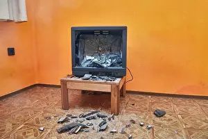 Destroy Prints: Olt tube TV set smashed with an axe, glass CRT imploding, pieces in the room everywhere