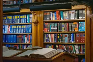 Camden Prints: Open books on wooden desks and bookshelves in Lincoln's Inn Library London, England