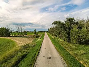 Open fields around rural road in midwest wisconsin during summertime